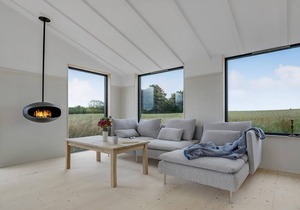 Modern, stylish cottage with bio fireplace, natural plot and views of fields.