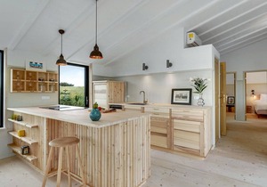 Modern, stylish cottage with bio fireplace, natural plot and views of fields.