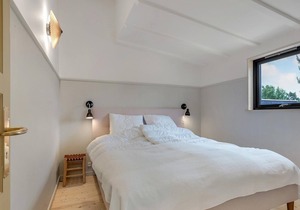 Modern, stylish cottage with bio fireplace, natural plot and views of fields.