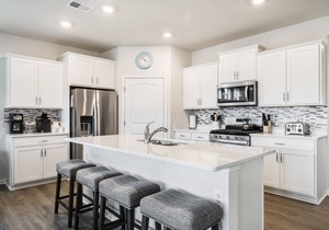 Ocean View Beach Club two-story home with patio, pool, tennis & gym