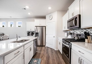 Ocean View Beach Club two-story home with patio, pool, tennis & gym