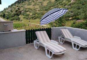 One bedroom house with terrace Postira, Brač (K-17571)