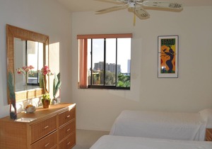 OUTSTANDING LOCATION. End Unit Top Floor Condo near Beach, favored Pelican Bay
