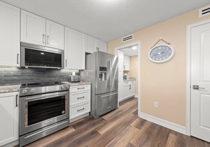 Pine Cove #101 is a 3/2 beachfront Sanibel vacation rental condo