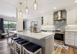 Renovated villa with fairway views, community pool & sundeck!