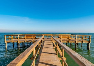 Rockport Racquet and Yacht Club condo with lovely bay views, tree covered grounds, pool, and fishing!