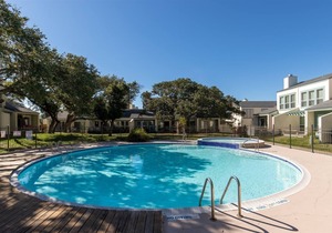 Rockport Racquet and Yacht Club condo with lovely bay views, tree covered grounds, pool, and fishing!