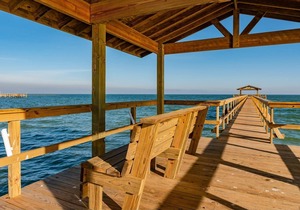 Rockport Racquet and Yacht Club condo with lovely tree covered grounds, pool, and fishing!