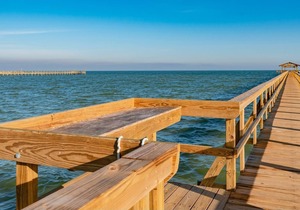 Rockport Racquet and Yacht Club condo with lovely tree covered grounds, pool, and fishing!