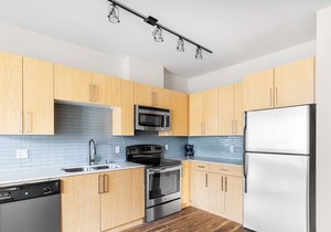 Sleek Ballard 1BR w/ Rooftop Deck & Yoga, walk to Dining, by Blueground