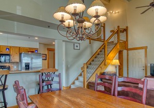 Spacious two-story condo w/ a shared hot tub, furnished balcony, & gas fireplace