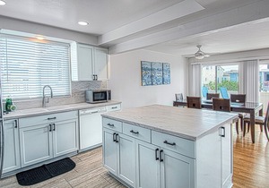 Spacious Upper unit located just two houses from the sand!