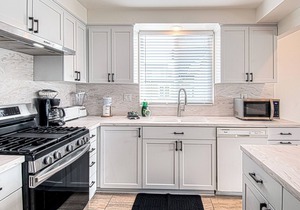 Spacious Upper unit located just two houses from the sand!