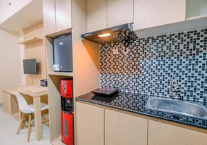 Studio Apartment Grand Taman Melati Margonda 2 near UI By Travelio