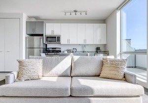 Stunning Logan Square 2BR w/Roof Deck & Gym, 1 block to L, by Blueground