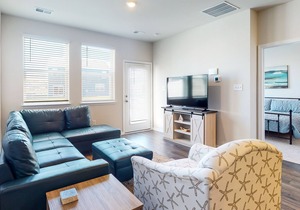 Stylish ocean view Beach Club townhouse with shared pool, sauna, tennis, & gym