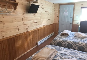 The Coastal Cabins- Cabin # 6 , walking minutes from the sandy beach