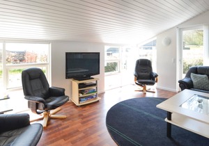 The cottage is beautifully placed on a large fenced natural ground, where lawn has been laid.