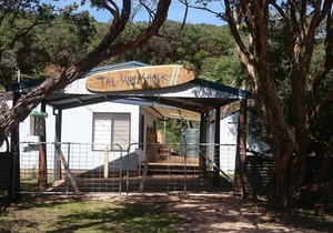 The Surf Shack is a short walk to the beautiful beach for relaxation or surfing.