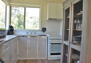 The Surf Shack is a short walk to the beautiful beach for relaxation or surfing.