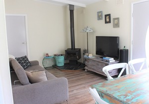 The Surf Shack is a short walk to the beautiful beach for relaxation or surfing.