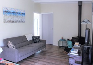 The Surf Shack is a short walk to the beautiful beach for relaxation or surfing.