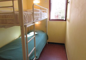 These charming vacation apartments (see FKO114) with a view of the Corsican mountains are part of a