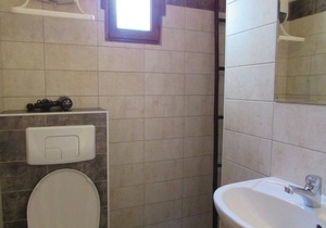 These charming vacation apartments (see FKO114) with a view of the Corsican mountains are part of a
