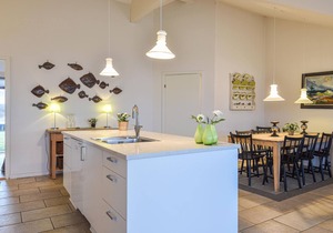 This well-equipped vacation home is located just a short walk from the sparkling North Sea with its
