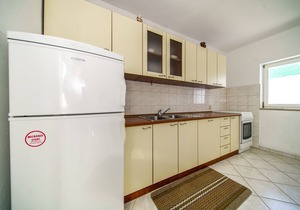 Three bedroom apartment with terrace and sea view Postira, Brač (A-18472-a)