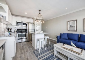 Trendy Beach Condo- Sunset views, Sandy Toes, Surfing more. (1304)