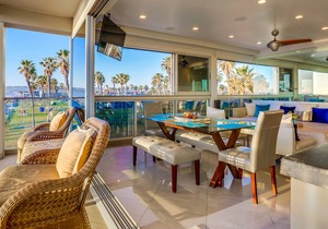 Unbeatable beachfront condo with modern kitchen, balcony & unparalleled sunsets