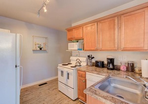 Walk to your Own Gated Retreat from Midtown's Best