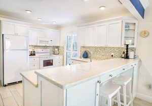 Watch the amazing sunset from your livingroom- directly across from the beach