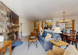 Welcoming condo with fireplace, seasonal pool, AC, washer/dryer, & wifi