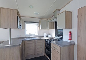 Wheelchair friendly caravan with one double and one twin.