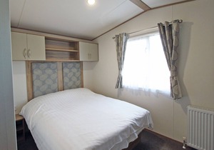 Wheelchair friendly caravan with one double and one twin.