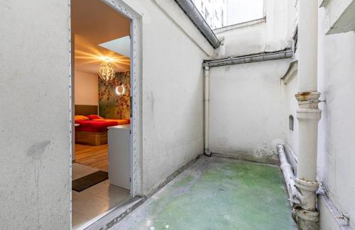 Saint-Vincent-de-Paul Apartment | Gare du Nord Confortable pied à terre avec patio