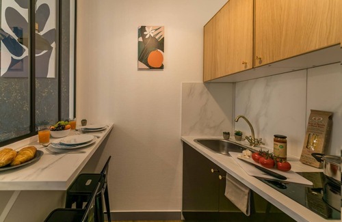 Quartier du Faubourg-Montmartre Apartment | Opéra - Rossini 26: cosy flat for 2