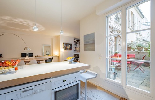 Quartier de la Porte-Saint-Denis Apartment | Open Secret, by Veeve