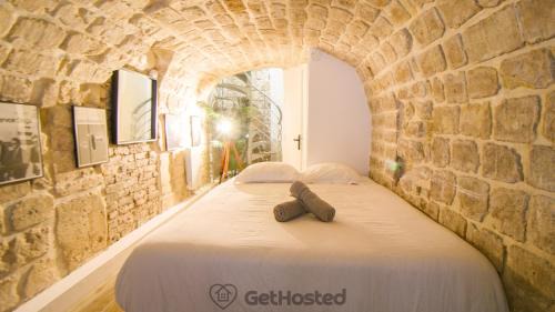 Quartier de la Porte-Saint-Denis Apartment | Paris Hideaway, Private Cinema - GetHosted