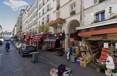 Montmartre Apartment | Rue Lepic - quintessential winding cobblestone street- Take a step into the past
