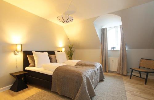 Copenhagen K Apartment | Unique 5 Bedroom Apartment w Exposed Beams in Copenhagen