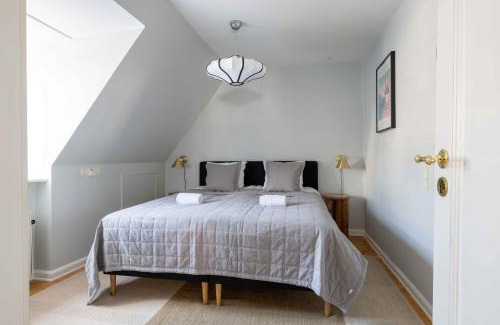 Copenhagen City Centre Apartment | Unique Apartment w Exposed Beams Next to Tivoli