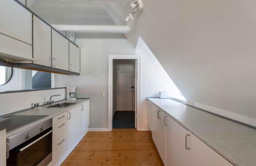 Copenhagen City Centre Apartment | Unique Apartment w Exposed Beams Next to Tivoli