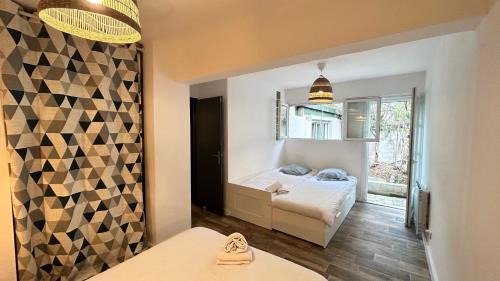 Celleneuve Apartment | 047- T2 Proche MBS, 4pers, Wifi, Parking, jardinet