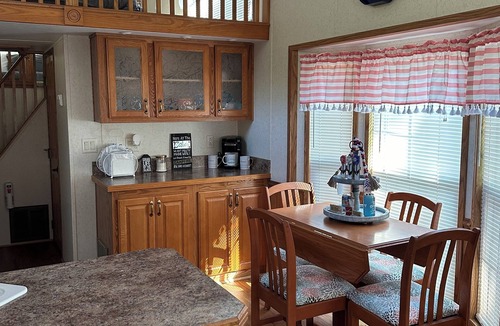 McGregor RV Rental | 1 bedroom, 2 loft Park Model in campground in Marquette, Iowa.