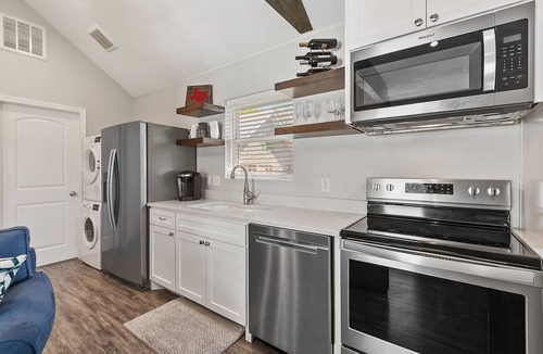 SoFi Condo | 1 BR condo in HEART of SOCO! 1 block to action!