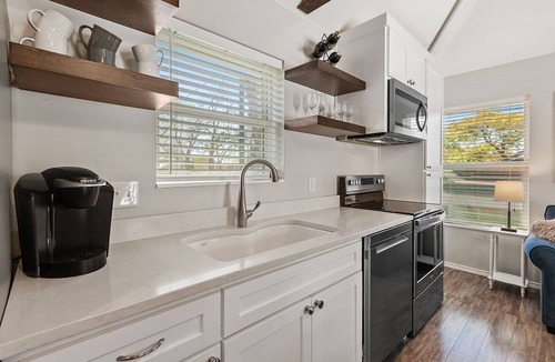 SoFi Condo | 1 BR condo in HEART of SOCO! 1 block to action!