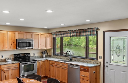 Thayer House | 100 ACRES WITH PRIVATE LAKE! Retro Riverside Retreat Groovy A-Frame
